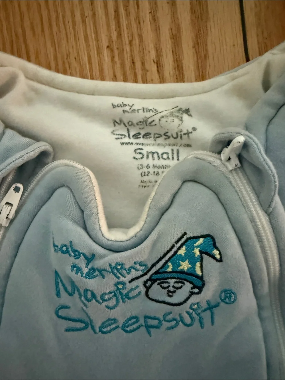 Baby Merlin’s Magic Sleepsuit Baby One-Piece in Light Blue